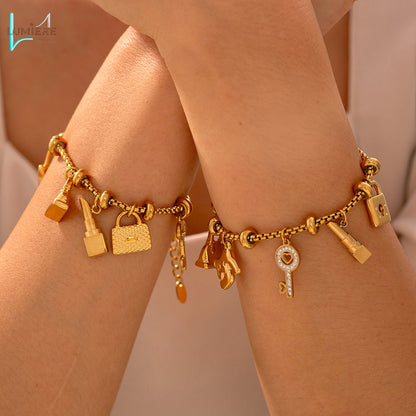 Titanium plated 18K gold multi-element hanging tag with diamond inlaid pendant bracelet