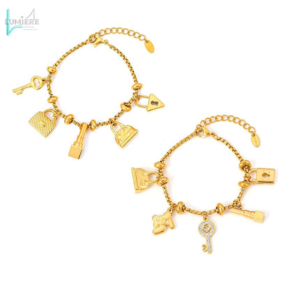 Titanium plated 18K gold multi-element hanging tag with diamond inlaid pendant bracelet