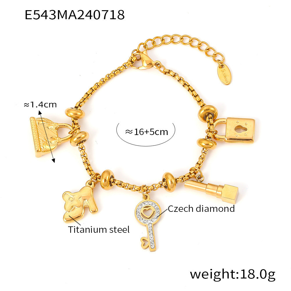 Titanium plated 18K gold multi-element hanging tag with diamond inlaid pendant bracelet