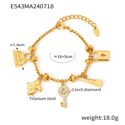 Titanium plated 18K gold multi-element hanging tag with diamond inlaid pendant bracelet