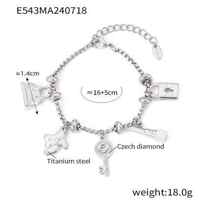 Titanium plated 18K gold multi-element hanging tag with diamond inlaid pendant bracelet